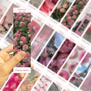 Close-up of pink rose bookmark with floral pattern and inspirational quote design
