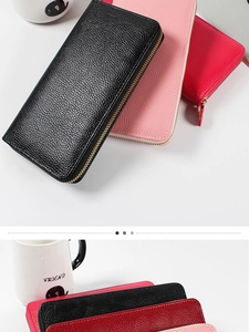 Close-up of pebble grain leather texture on long zip-around wallets for women
