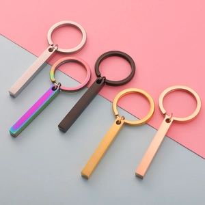 Minimalist stainless steel bar keychains in silver, gold, rose gold, black, and rainbow colors