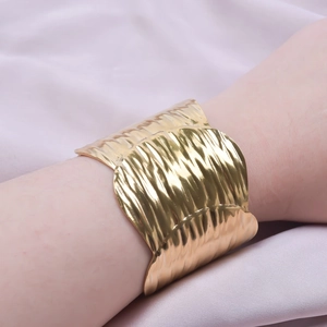 Polished 18k gold plated stainless steel open bangle with hammered wave texture