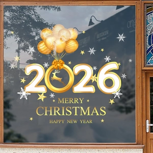 Golden 2026 Christmas window stickers with elk and balloon motifs on glass store front