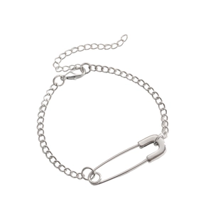 Detail of silver safety pin pendant necklace with adjustable chain and lobster clasp