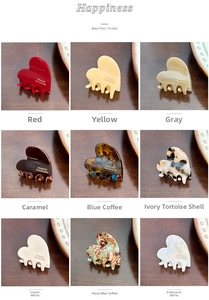 Nine colorful heart-shaped mini hair clips displayed in a neat 3x3 grid layout