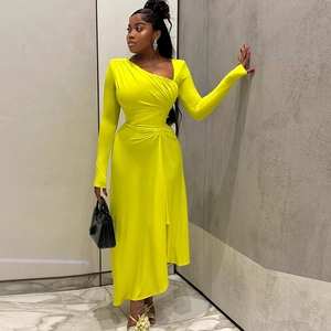 Elegant slim-fit ruched asymmetric dress with long sleeves and slanted neckline in bright yellow
