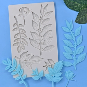 White silicone mold for DIY baking with rose and leaf patterns for fondant cakes