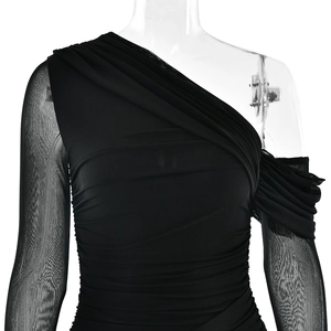 Detail of black one-shoulder dress with mesh splicing and elegant ruched textures