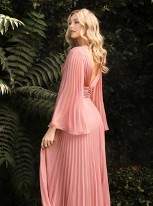 Detailed back view of pink pleated V-neck maxi dress with flare sleeves and open back
