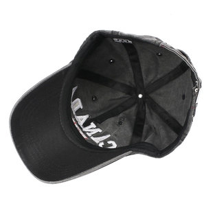 Detailed interior of a grey washed cotton baseball cap with 100% cotton label and strap