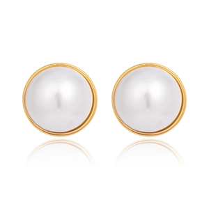Close-up of elegant round pearl stud earrings with gold stainless steel borders
