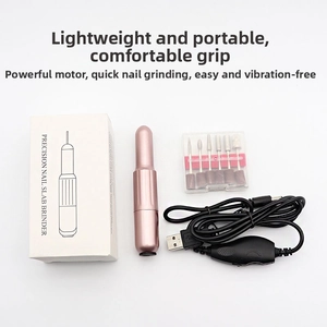 Pink electric nail drill kit with six grinding heads and USB cable for manicure care