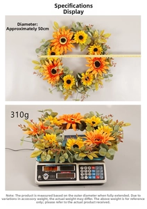 Detail showing 50cm diameter measurement and 310g weight of the sunflower wreath