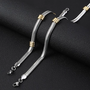 Close-up of 6mm two-tone stainless steel snake chain necklace with gold bead details