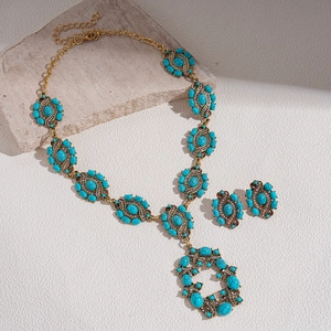 Parure de bijoux bohème vintage avec pendentifs ovales en résine turquoise et cristaux