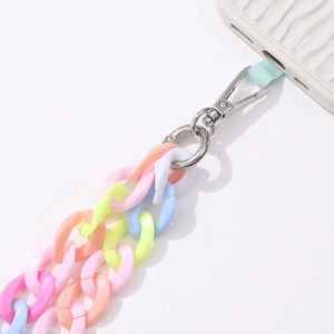 Macro detail of macaron acrylic chain strap with silver lobster clasp for crossbody phone case