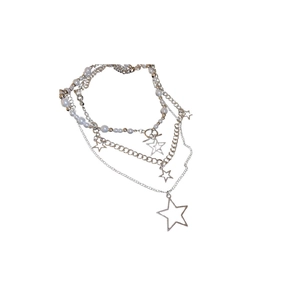 Multilayer silver necklace set with stars and pearls pendants for a trendy layered look