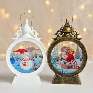 Christmas LED lantern set with Snowman and Santa Claus patterns in a warm bokeh scene