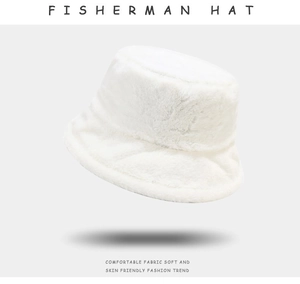 Close-up of white plush fisherman hat showing soft faux fur texture and warm fabric