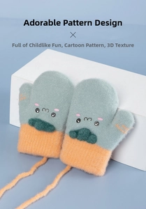 Detail view of children's knit mittens with cat face design and anti-lost neck string