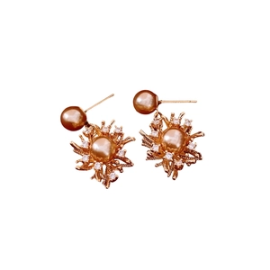 Elegant 18K gold-plated firework earrings with champagne pearls and sparkling crystals