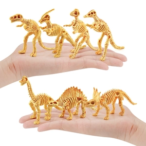 Mini dinosaur skeleton fossil models including T-Rex and Triceratops held in hand