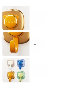 Detail of colorful J-shaped adhesive hooks with rounded edges and high gloss finish
