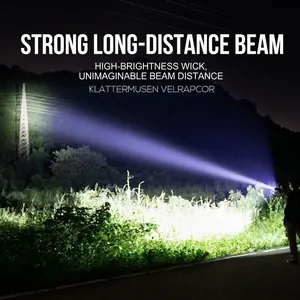 Powerful mini LED flashlight with long-range beam lighting up a power tower at night
