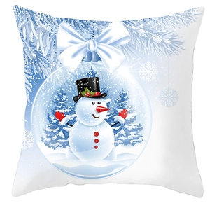 Detailed close-up of Christmas snowflake cushion cover featuring snowman snow globe design