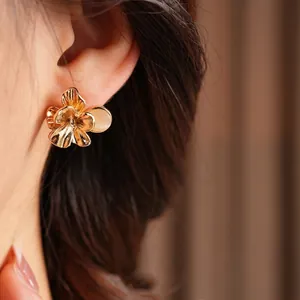 Vintage golden brushed flower earrings with cat-eye stone, elegant minimalist floral design
