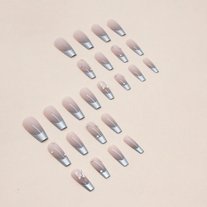 Medium ballerina nails with metallic grey gradient, pearls, and silver butterfly charms