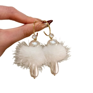 Elegant C-shaped pearl earrings with fluffy white fur balls and baroque pearl pendants