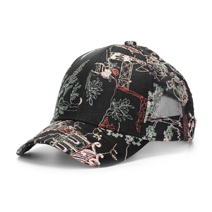 Detail view of women's Chinese style jacquard baseball cap with floral embroidery