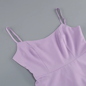 Close-up of adjustable spaghetti straps and stitching on a lilac A-line dress