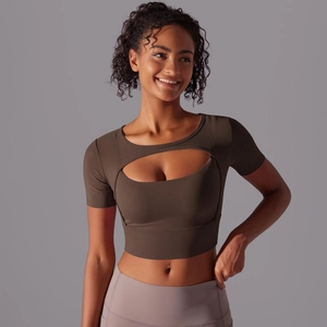 Close-up of brown yoga top featuring a unique oval cutout and double-layer support