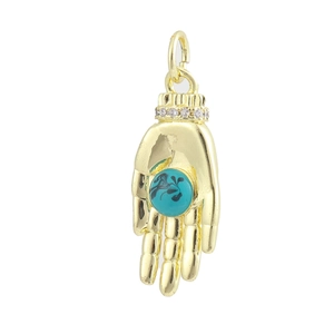 Detail of 18K gold plated hand pendant with blue evil eye and micro zircon inlay