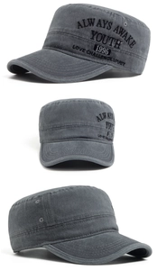 Detail of vintage washed grey cadet hat with side embroidery and military flat top style
