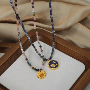 Handmade beaded necklace with blue lapis stones and 316L stainless steel angel pendant
