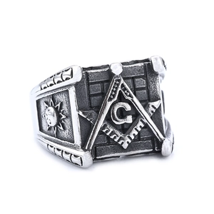 Vintage silver stainless steel Masonic ring featuring sun, moon, and compass engravings