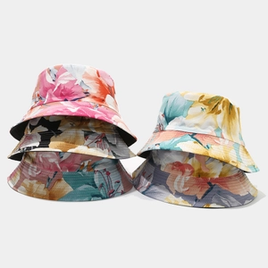 Floral print reversible cotton bucket hats in multiple colors for sun protection