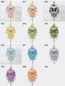Detailed grid showing lace butterfly embroidery and long fringe on triangular shawls