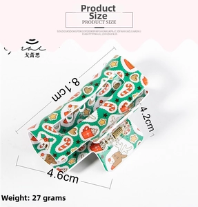 Detailed dimensions of green Christmas claw clip with reindeer and candy cane patterns