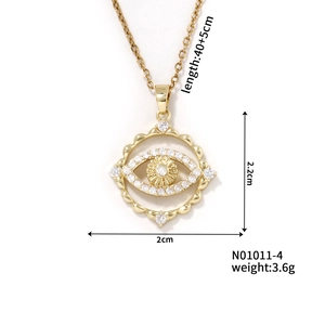 Detail view of eye pendant necklace with rhinestones and size specifications 40+5cm