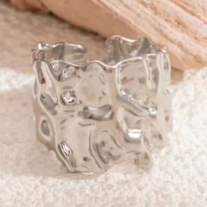 Minimalist silver starfish textured titanium steel ring with vintage hammered finish style