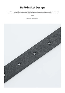 Detail view of black lychee-textured leather belt with circular adjustment holes