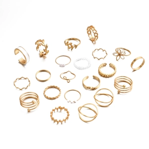 21pcs bohemian gold ring set featuring butterfly leaf motifs and pearl accents on white