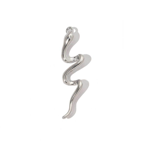 Detailed view of silver snake-shaped pendant with polished stainless steel surface