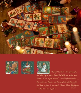 Macro shot of vintage Christmas sticker book featuring Santa, bears, and winter scenery