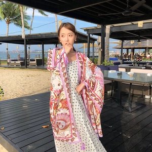 Pink and purple bohemian paisley shawl for women at the beach summer vacation