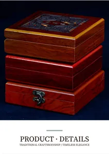Detail of premium wooden gift boxes featuring traditional Chinese hollow carving and metal clasps