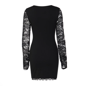 Close-up of the back tailoring and detailed floral lace sleeves on a slim black dress