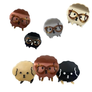 Cute acetate puppy claw clips for women featuring cartoon dog designs in various colors